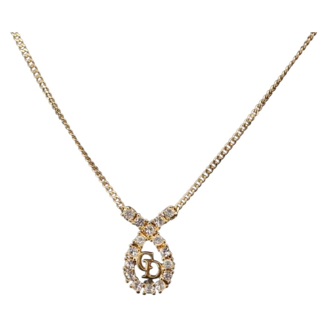 Christian Dior Gold Tone Metal Rhinestone Necklace: Christian Dior Gold Tone Metal Rhinestone Necklace Christian Dior rhinestone necklace in gold-tone metal. The necklace has a total length of approximately 44 cm (17.3 inches). Condition is AB, describ