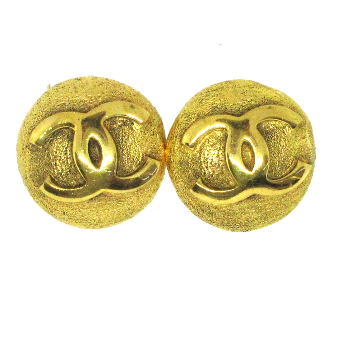 Chanel CC Logo Button Clip-On Earrings Gold Tone: Chanel CC Logo Button Clip-On Earrings Gold Tone Pair of Chanel button-style clip-on earrings featuring the CC logo in a gold-tone finish. Made in France, these earrings have a classic logo design and