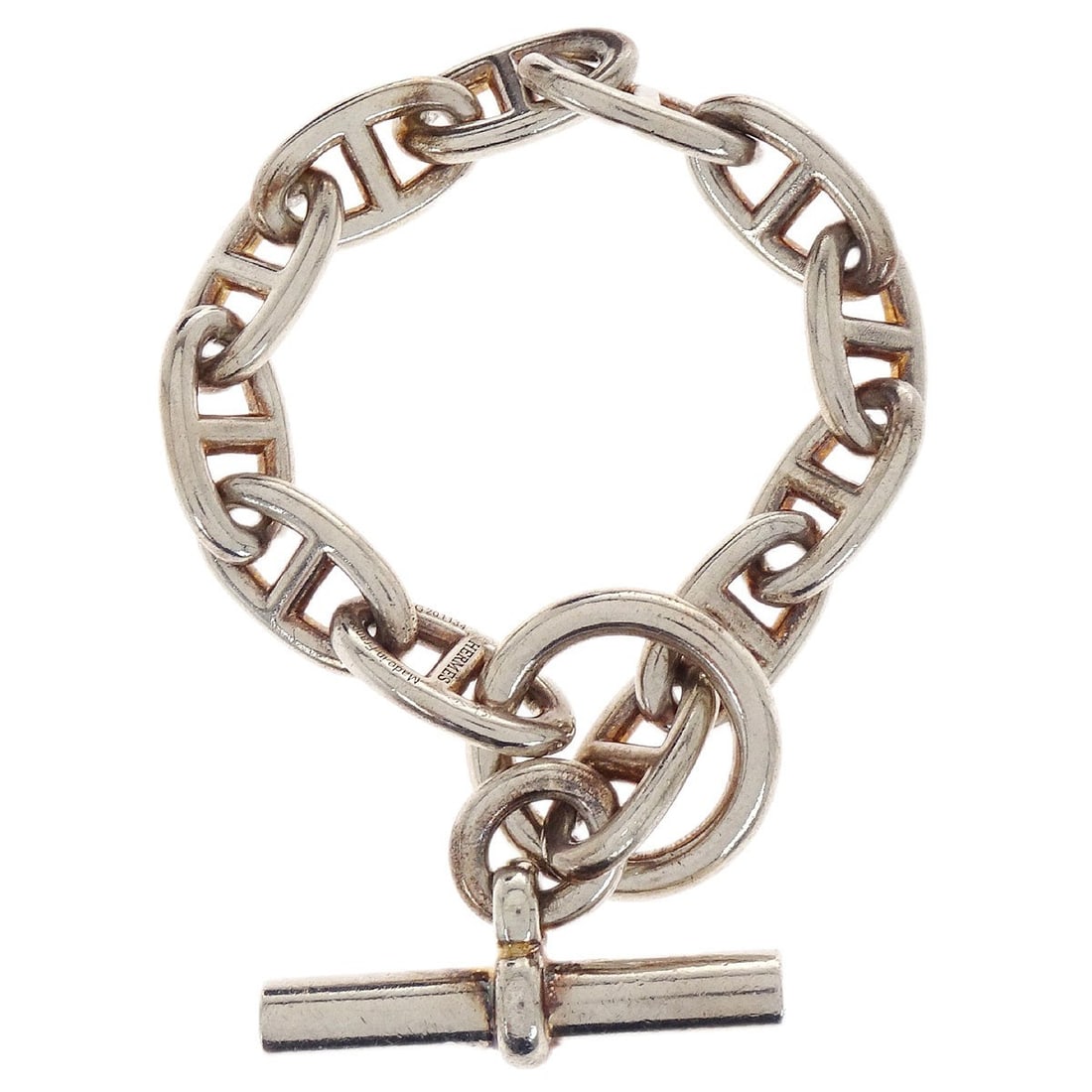 Hermes Chaine d'Ancre GM Ag925 Silver Chain Bracelet: Hermes Chaine d'Ancre GM Ag925 Silver Chain Bracelet Vintage Hermes Chaine d'Ancre GM bracelet crafted in Ag925 silver with a classic chain style. Made in France, this bracelet features a silver-tone 