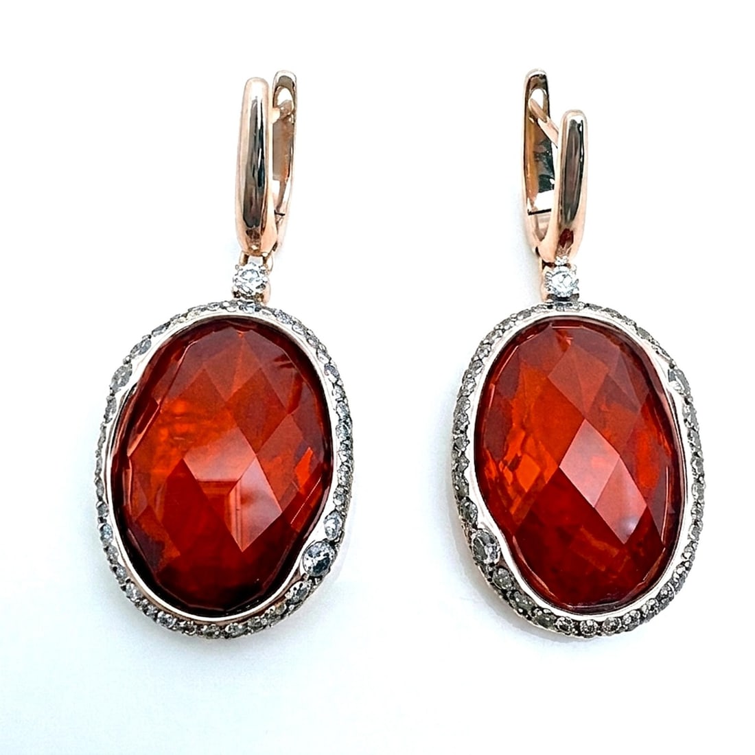 Crivelli 18K Yellow Gold Oval Drop Earrings Ruby Quartz Diamond: Crivelli 18K Yellow Gold Oval Drop Earrings Ruby Quartz Diamond These elegant Crivelli drop earrings are expertly crafted from 18k yellow gold and feature a striking oval-shaped ruby quartz centerpiec
