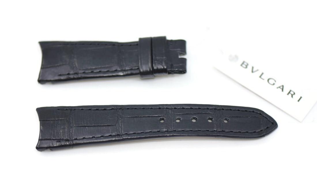 Authentic Bulgari Black Leather Wristwatch Strap 18mm: Authentic Bulgari Black Leather Wristwatch Strap 18mm This Bulgari wristwatch band features a sleek black leather construction, designed for both comfort and style. With a width of 18 mm, this strap i