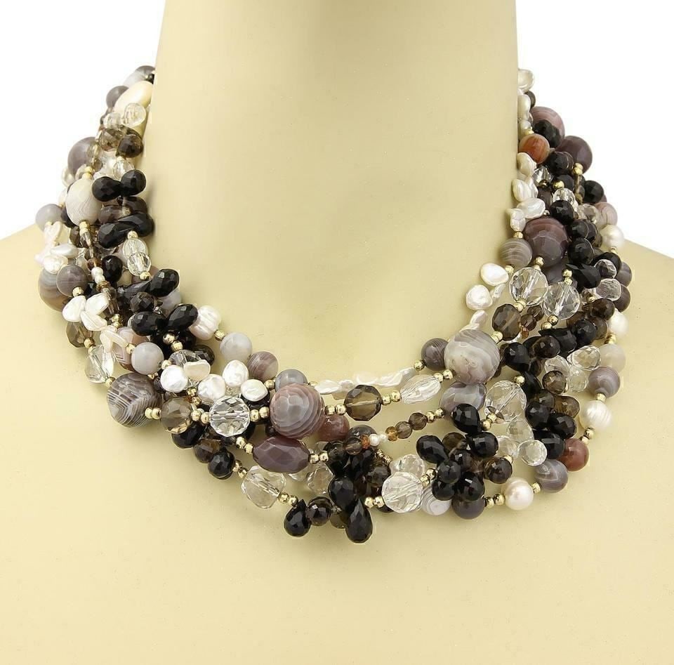 Vintage 14k Yellow Gold Six Strand Necklace with Multicolor Gemstone Beads: Vintage 14k Yellow Gold Six Strand Necklace with Multicolor Gemstone Beads This vintage estate six strand necklace is crafted in 14k yellow gold and features multi-color gemstones in varying shapes an