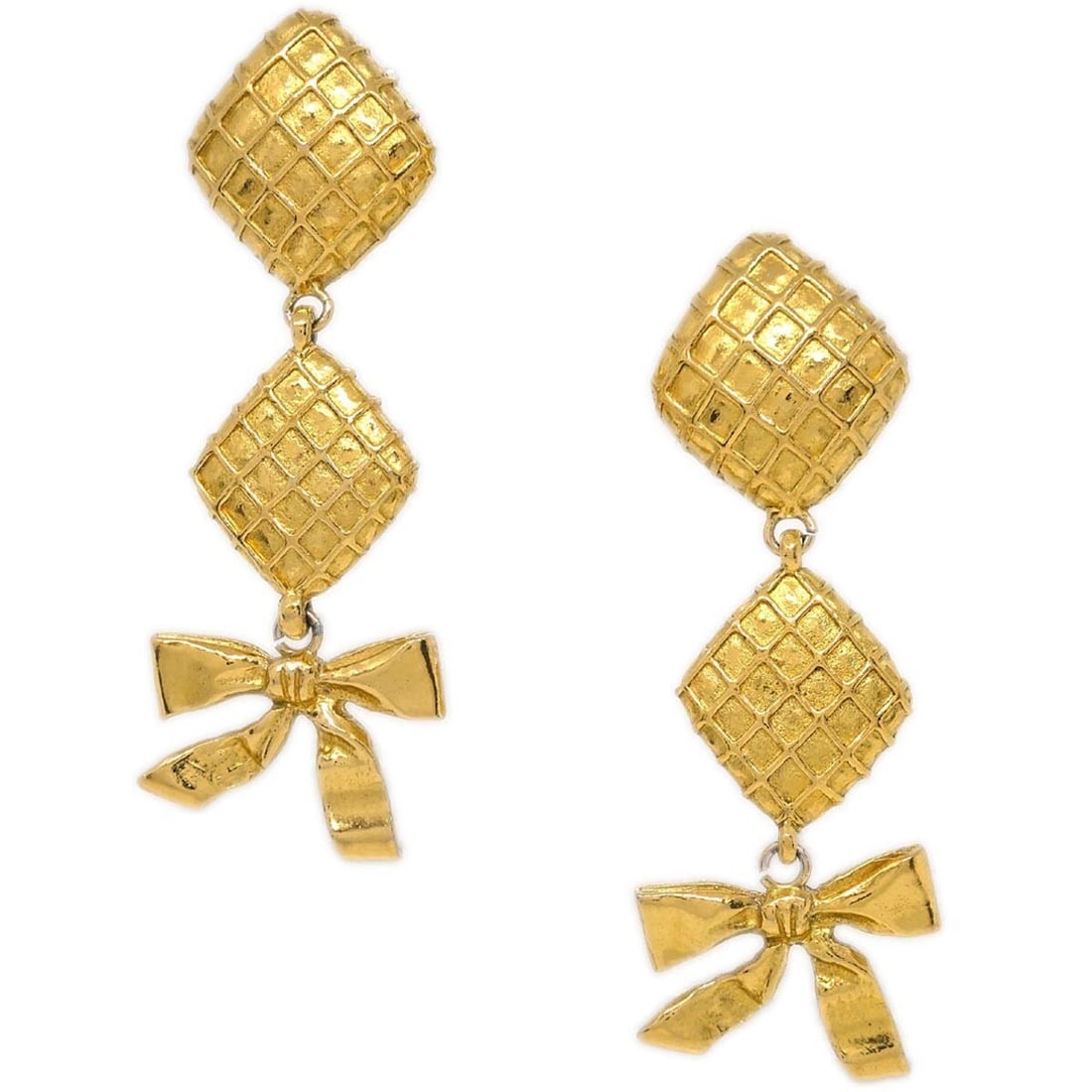 Chanel Bow Rhombus Clip On Dangle Earrings Gold Plated: Chanel Bow Rhombus Clip On Dangle Earrings Gold Plated Clip-on Chanel dangle earrings in a gold-tone finish with a bow and rhombus design. Made in France, this pair presents in very good condition and