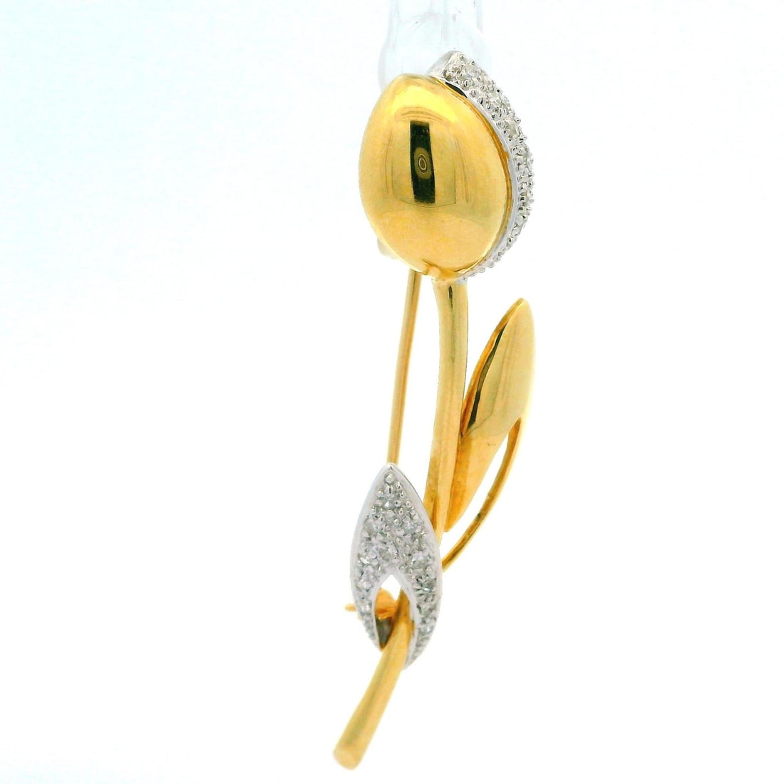 14k Gold Diamond Tulip Brooch with Natural Diamonds: 14k Gold Diamond Tulip Brooch with Natural Diamonds This exquisite brooch features a stunning tulip design crafted from 14k yellow gold with elegant white gold accents. It showcases a total of 22 natu