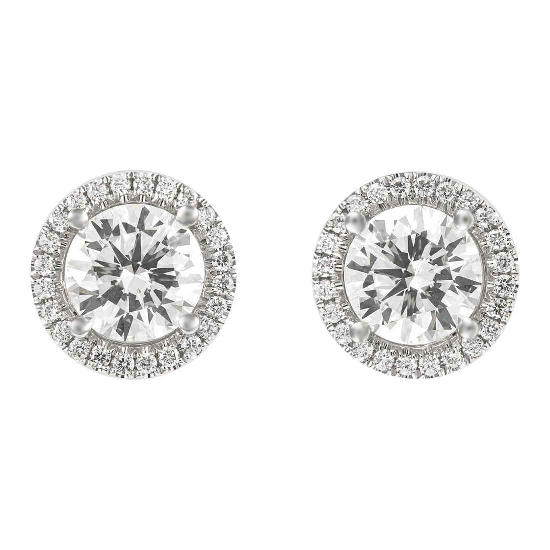 EGL Certified 4.82ct Diamond Halo Earrings 18k White Gold: EGL Certified 4.82ct Diamond Halo Earrings 18k White Gold Discover the elegance of these stunning diamond halo stud earrings, crafted in luxurious 18k white gold. Each earring features a center stone 