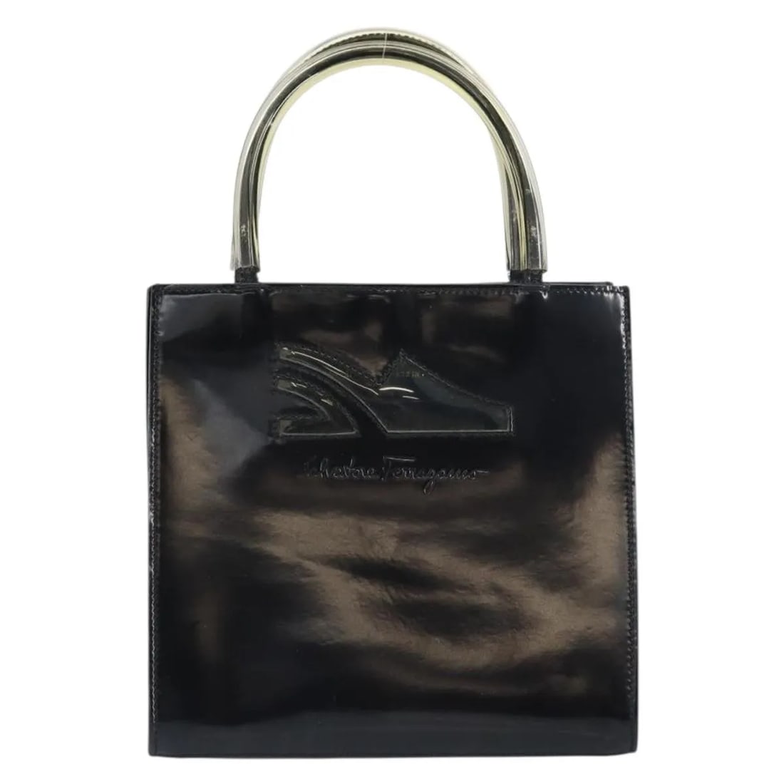 Black Patent Leather Vintage Handbag by Salvatore Ferragamo Italy: Black Patent Leather Vintage Handbag by Salvatore Ferragamo Italy This Salvatore Ferragamo vintage handbag is crafted from black patent leather and designed for women. It features a classic silhouette