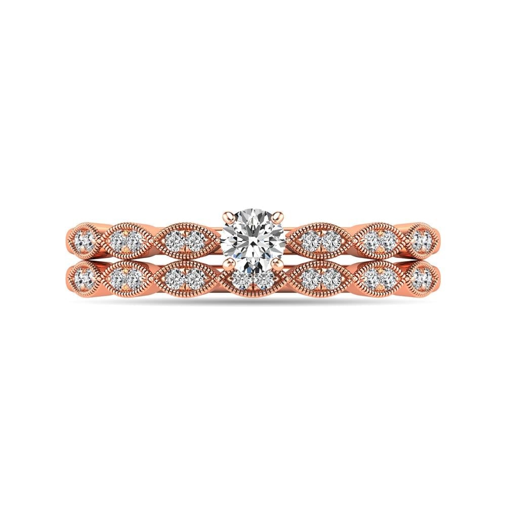 Diamond 1/3 Ct.tw Bridal Ring in 10K Rose Gold: Diamond 1/3 Ct.tw Bridal Ring in 10K Rose Gold 10k Rose Gold Stone Color: G-h Stone Clarity: I2 Each ring is presented in standard size 6.5. Complimentary resizing is available between sizes 510 (in 1