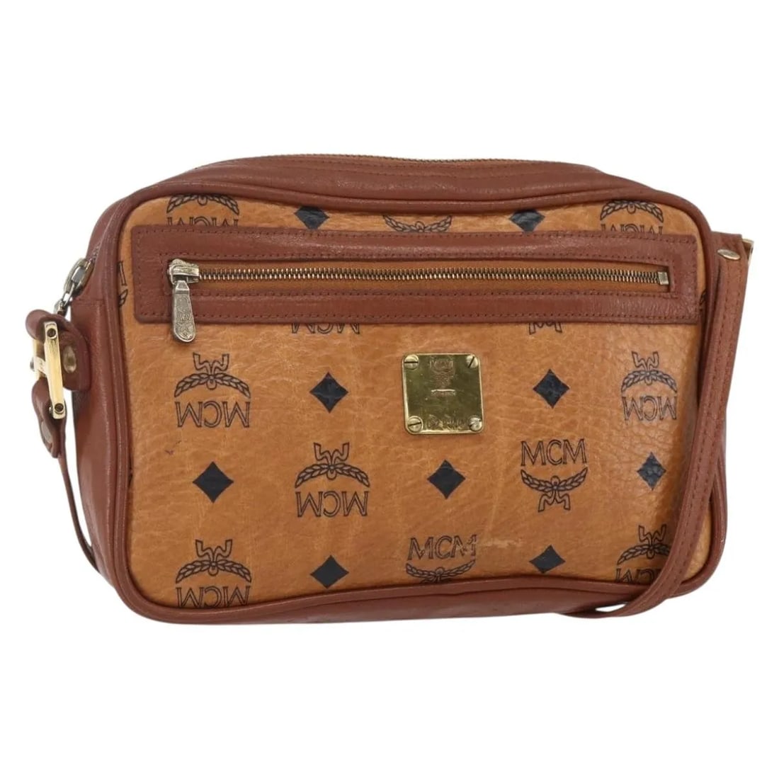 MCM Visetos Brown Canvas Shoulder Bag with Leather Trim: MCM Visetos Brown Canvas Shoulder Bag with Leather Trim This pre-owned MCM Visetos shoulder bag for women features a brown canvas body with leather accents. It has a compact design suitable for everyd