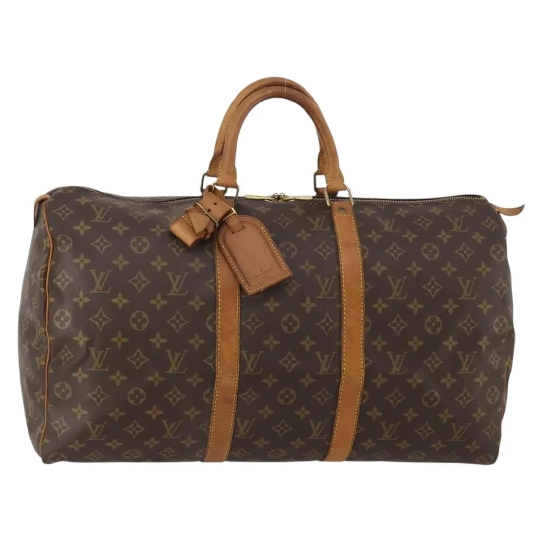 Louis Vuitton Keepall travel bag in brown monogram canvas: Louis Vuitton Keepall travel bag in brown monogram canvas Louis Vuitton Keepall in brown monogram canvas. This unisex travel bag is made in France and shows fair overall condition with visible signs o