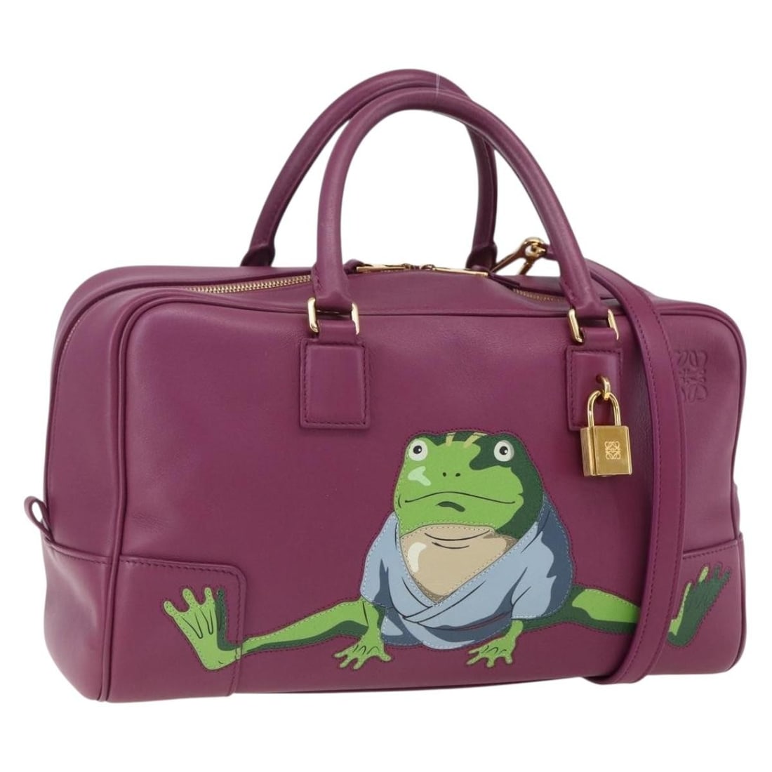 LOEWE Americana 28 leather handbag with strap and padlock: LOEWE Americana 28 leather handbag with strap and padlock LOEWE Studio Ghibli Spirited Away Americana 28 handbag in purple and gold leather. Made in Spain, this women's handbag includes a dust bag, pa