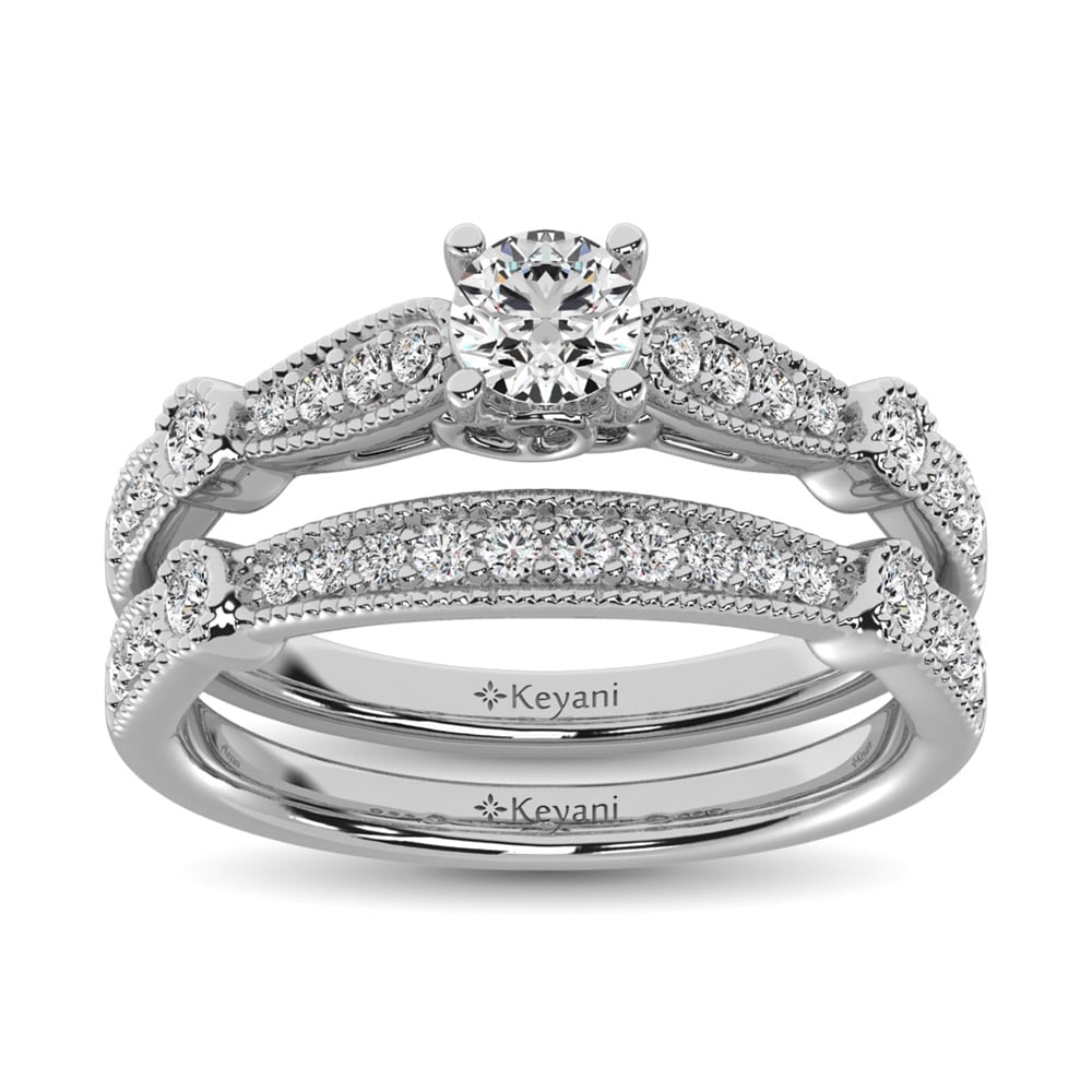 Diamond 3/4 Ct.Tw. Bridal Ring in 14K White Gold: Diamond 3/4 Ct.Tw. Bridal Ring in 14K White Gold 14k White Gold Stone Color: G-h Stone Clarity: Si2 Each ring is presented in standard size 6.5. Complimentary resizing is available between sizes 510 (