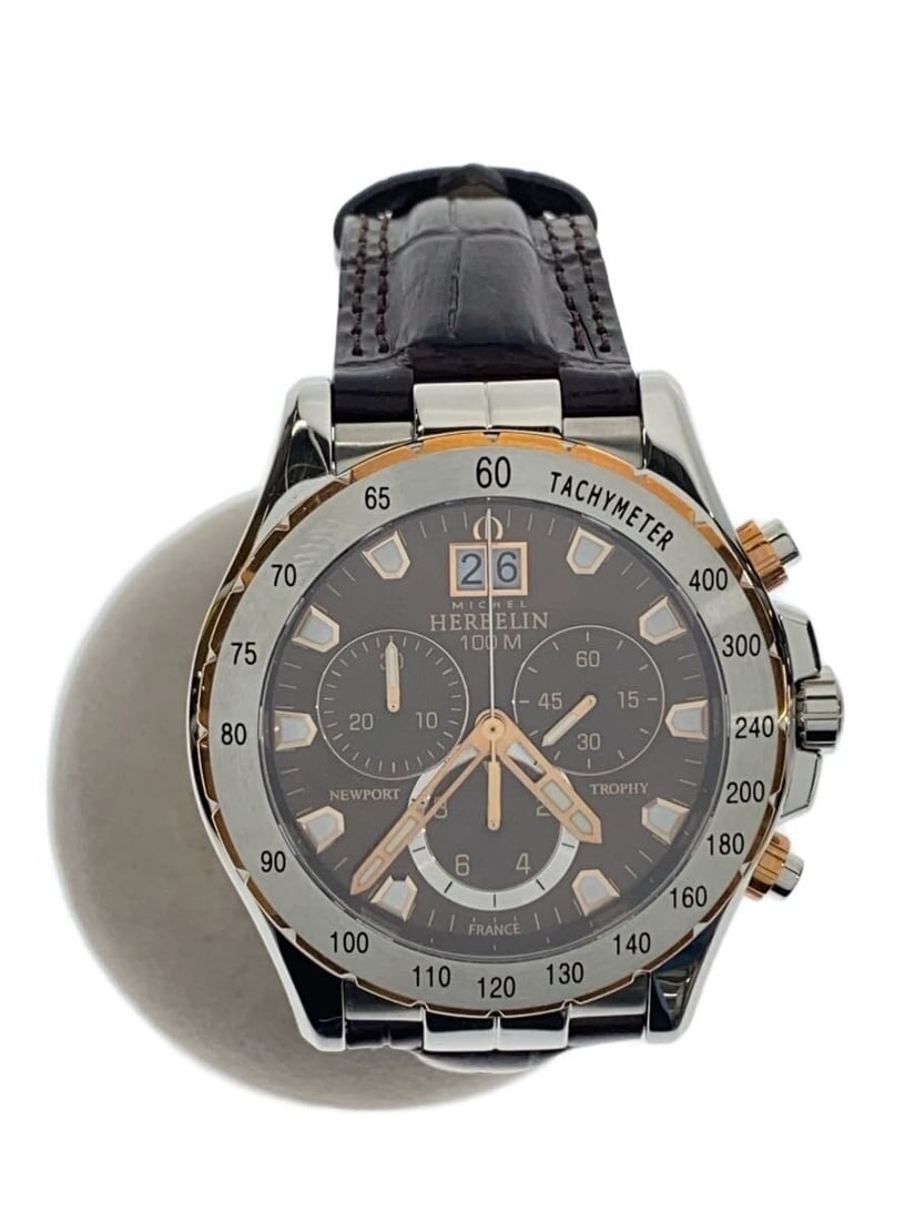 Michel Herbelin Newport Trophy quartz brown leather wristwatch: Michel Herbelin Newport Trophy quartz brown leather wristwatch This MICHEL HERBELIN Newport Trophy Quartz 36675 men's wristwatch is crafted in France and features a brown leather band. The watch is pr