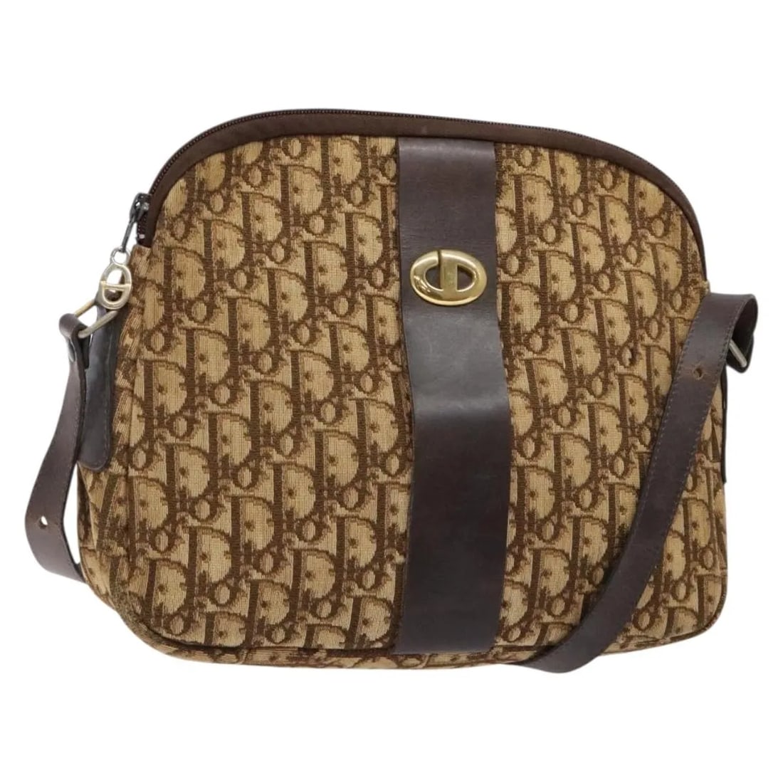 Christian Dior Vintage Trotter Brown Canvas Shoulder Bag: Christian Dior Vintage Trotter Brown Canvas Shoulder Bag This Christian Dior Vintage Trotter shoulder bag is crafted from brown canvas, designed for women. It shows signs of wear including loss of sha