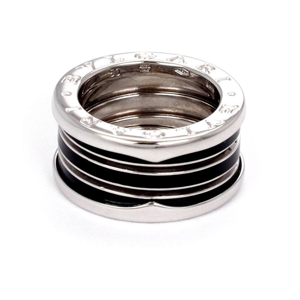Bvlgari B Zero-1 Black Enamel 18k White Gold Ring US 5: Bvlgari B Zero-1 Black Enamel 18k White Gold Ring US 5 Elevate your style with this authentic Bvlgari B Zero-1 ring, expertly crafted from luxurious 18k white gold and adorned with striking black enam