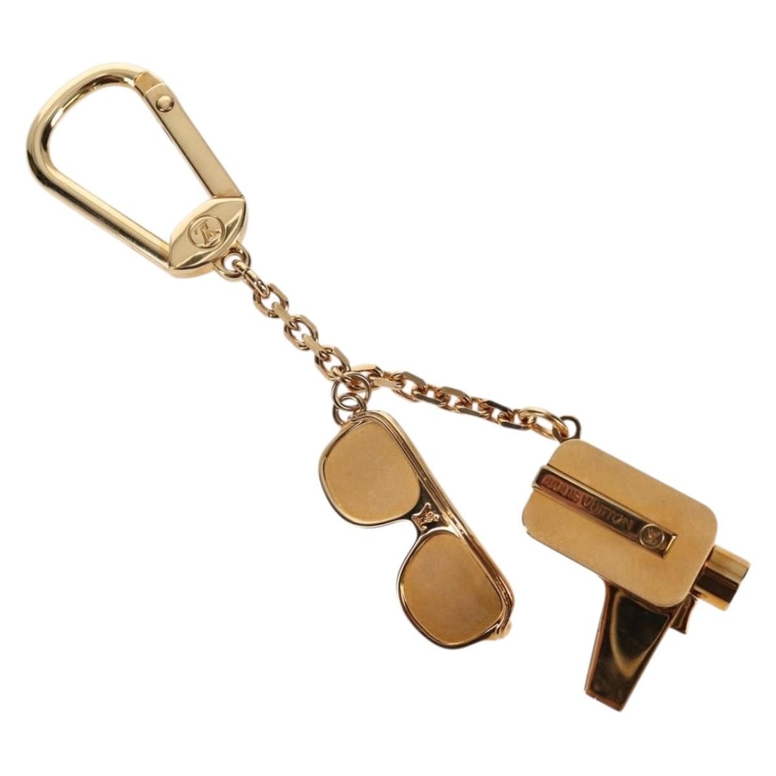 Louis Vuitton M65383 metal key holder gold tone Porte Cles Cannes: Louis Vuitton M65383 metal key holder gold tone Porte Cles Cannes Louis Vuitton Porte Cles Cannes key holder in gold-tone metal. This women's accessory is identified as style M65383 and is offered in 