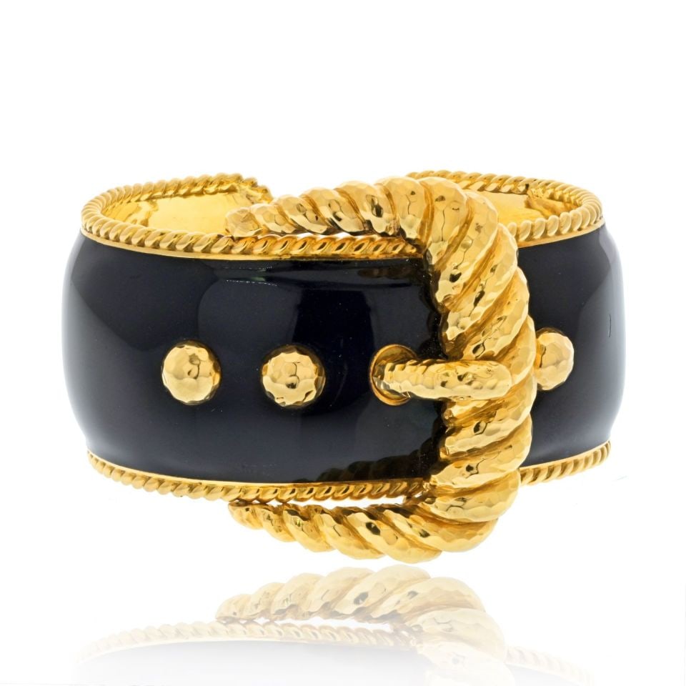 David Webb Platinum 18K Yellow Gold Black Enamel Cuff Bracelet: David Webb Platinum 18K Yellow Gold Black Enamel Cuff Bracelet This exquisite David Webb cuff bracelet is crafted from a luxurious blend of platinum and 18K yellow gold, weighing 109.1 grams. The desi