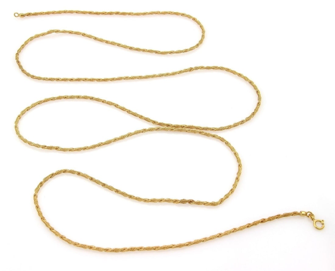 18k Yellow Gold Twisted Mesh Necklace 52.5in Unbranded: 18k Yellow Gold Twisted Mesh Necklace 52.5in Unbranded Vintage/estate twisted mesh necklace crafted in 18k yellow gold with a refined woven texture and fluid movement. The necklace measures approximat