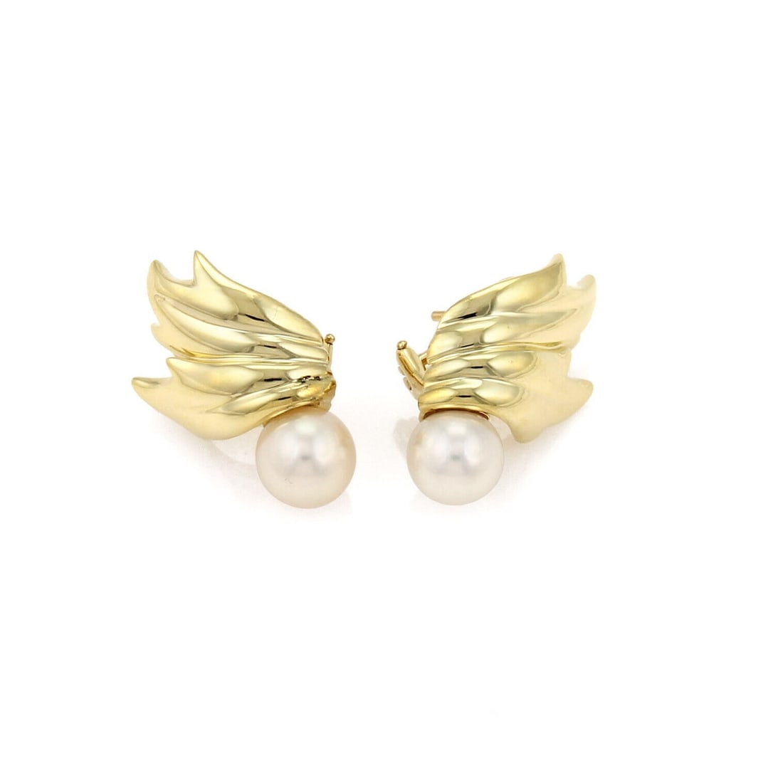 Tiffany & Co Pearl Leaf Drop Earrings in 18k Yellow Gold: Tiffany & Co Pearl Leaf Drop Earrings in 18k Yellow Gold Pearl leaf drop earrings crafted in 18k yellow gold with cultured pearls measuring approximately 7.5-8 mm each. The design features sculptural 