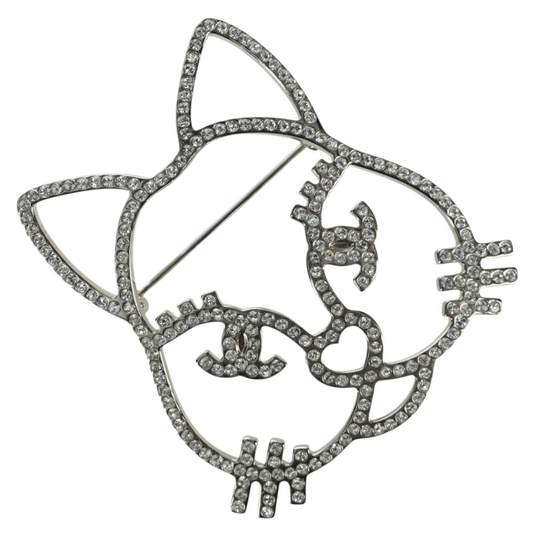Silver Metal Cat Motif Brooch CHANEL CC Logo with Box and Dust Bag: Silver Metal Cat Motif Brooch CHANEL CC Logo with Box and Dust Bag This CHANEL brooch features a cat design crafted from silver-tone metal. Designed for women, it is made in Italy and comes with a dus