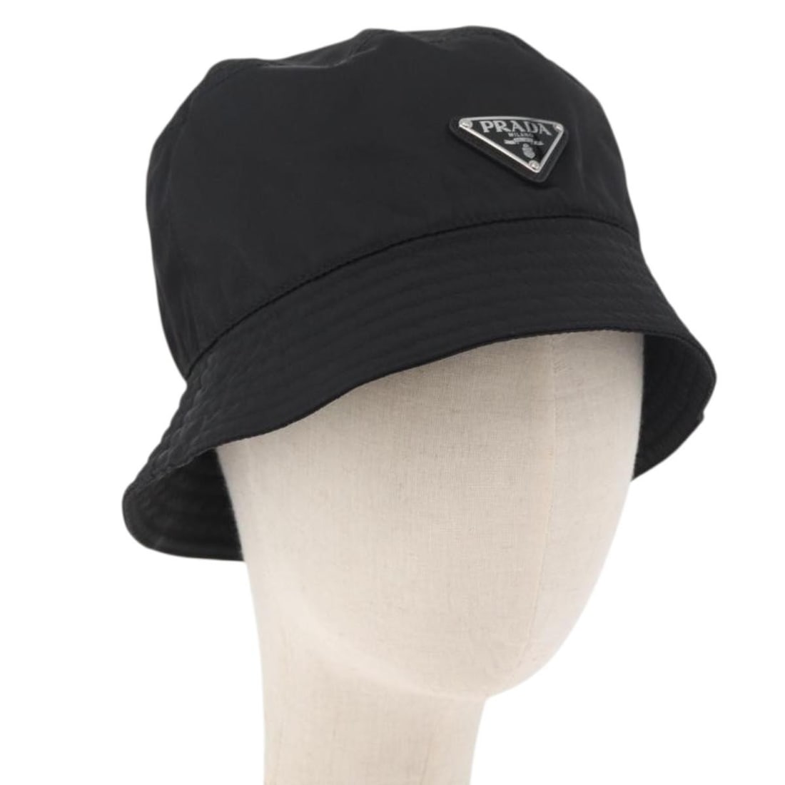 Black Nylon Hat PRADA Made in Italy 55cm: Black Nylon Hat PRADA Made in Italy 55cm Black nylon Prada hat in size M, made in Italy. The item is offered in very good AB condition with partly rubbing and stains on the outside and inside, along w