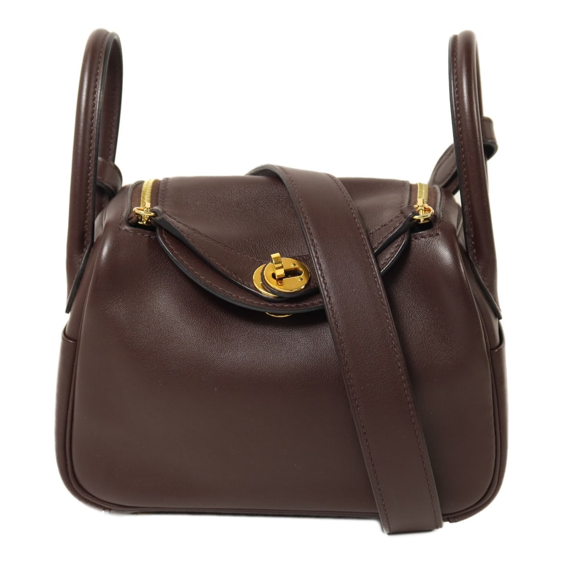 Hermes Mini Lindy 2 Way Swift Leather Shoulder Handbag Rouge Sellier: Hermes Mini Lindy 2 Way Swift Leather Shoulder Handbag Rouge Sellier Mini Lindy 2 Way Shoulder Bag Handbag in Veau Swift leather and calfskin (cowhide), presented in Rouge Sellier x Brown x Rouge Sell