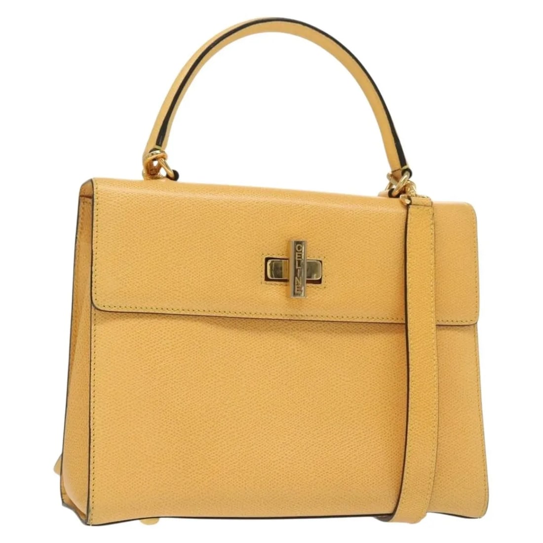 Celine Leather Convertible Top Handle Bag Vintage Yellow: Celine Leather Convertible Top Handle Bag Vintage Yellow This vintage convertible top handle bag by Celine is crafted from yellow leather and designed for women. It features a turnlock closure and inc