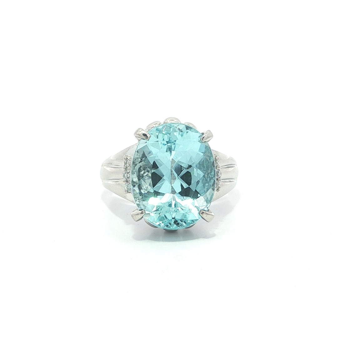 Platinum Cocktail Ring Featuring 6.33ct Oval Aquamarine and Diamond Accents: Platinum Cocktail Ring Featuring 6.33ct Oval Aquamarine and Diamond Accents This elegant cocktail ring features a natural, genuine oval aquamarine weighing 6.24 carats, set in solid .900 platinum. The