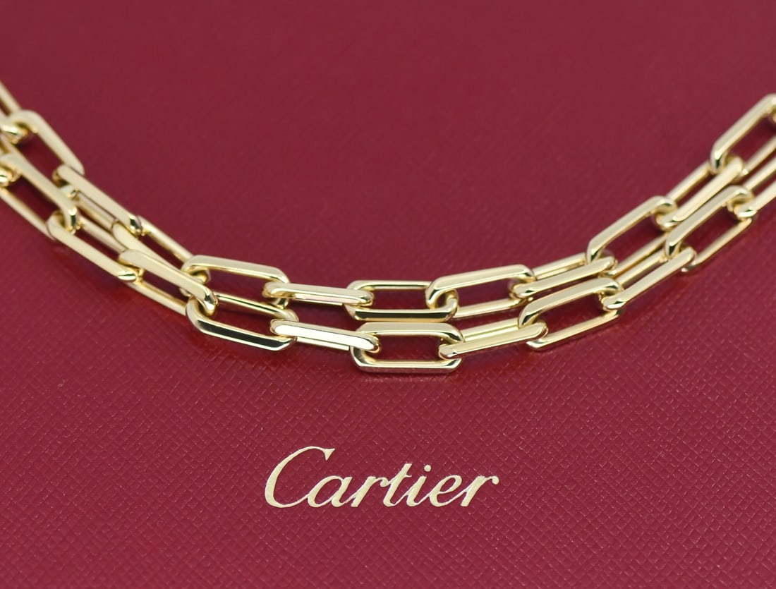 Cartier Santos 18K Yellow Gold Chain Necklace Medium 22 Inches: Cartier Santos 18K Yellow Gold Chain Necklace Medium 22 Inches Cartier Santos medium necklace in a chain style, crafted in 18k yellow gold. It features 12 x 5 mm links, measures 22 inches in length, a