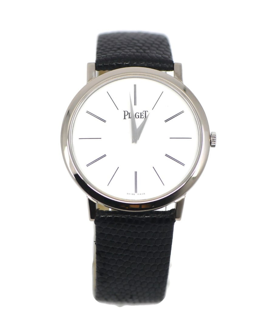 Piaget Altiplano 18K White Gold Men s Wristwatch P10174: Piaget Altiplano 18K White Gold Men s Wristwatch P10174 This Piaget Altiplano wristwatch features a 38mm case crafted from 18K white gold with a polished finish. It is equipped with a manual mechanica