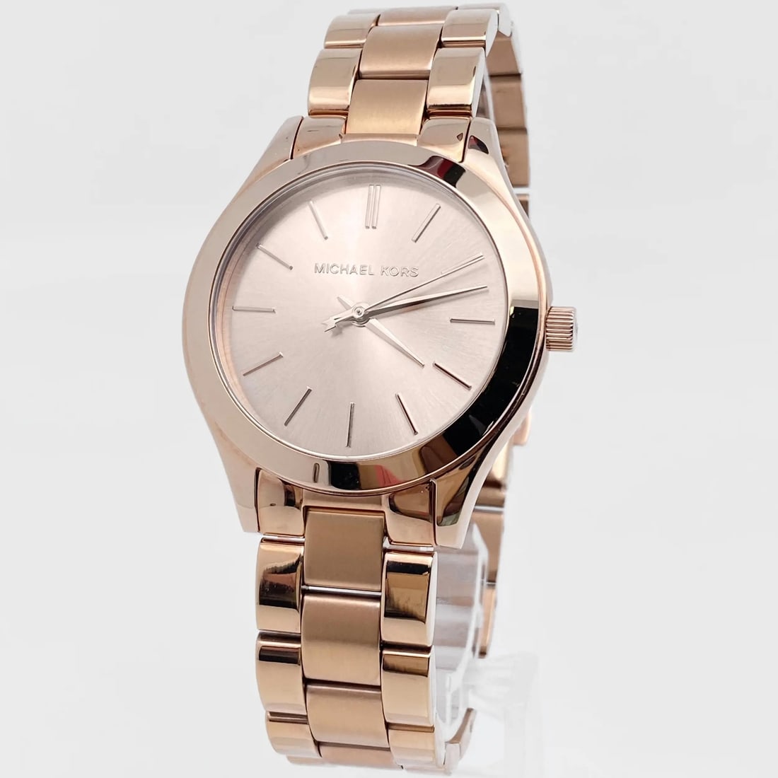 Michael Kors Slim Runway 34mm Quartz Ladies Watch MK3513 Rose Gold Dial: Michael Kors Slim Runway 34mm Quartz Ladies Watch MK3513 Rose Gold Dial This Michael Kors Mini Slim Runway wristwatch combines elegance and functionality, making it a perfect accessory for any formal 