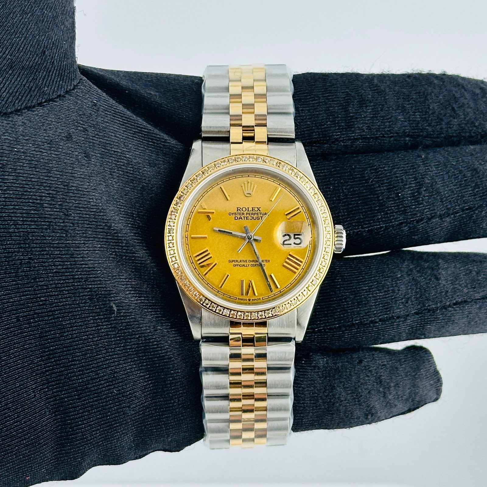 Rolex Aftermarket Champagne Roman Dial Jubilee Bracelet Watch Ref 1601: Rolex Aftermarket Champagne Roman Dial Jubilee Bracelet Watch Ref 1601 This men's Rolex Datejust features an aftermarket champagne Roman stick dial and is equipped with an aftermarket Jubilee bracelet