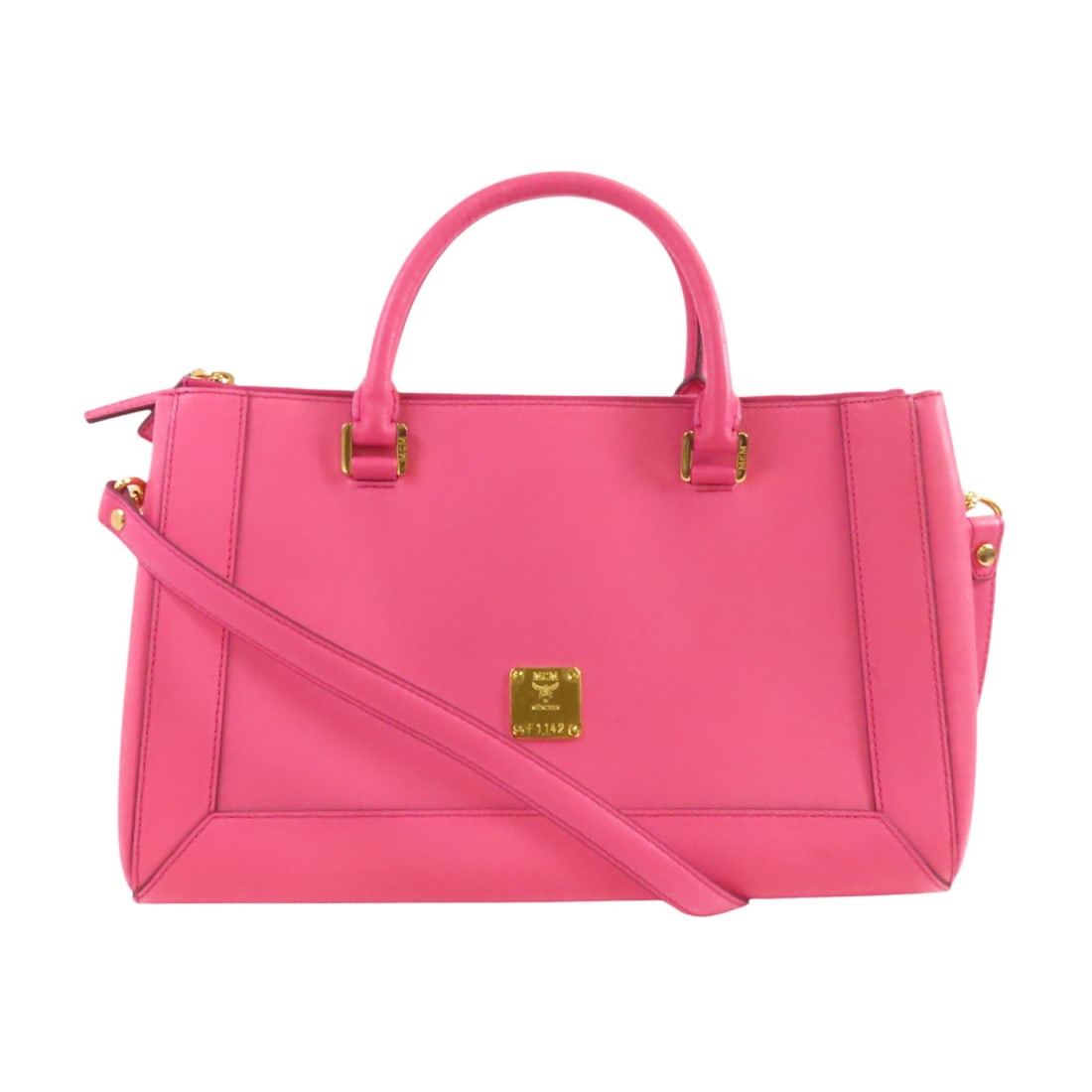 MCM 2way Shoulder Crossbody Bag Pink Calfskin Leather: MCM 2way Shoulder Crossbody Bag Pink Calfskin Leather This MCM 2-way shoulder bag is crafted from calfskin (cowhide) leather in pink with pink frame color and gold-tone hardware. It is designed for wo