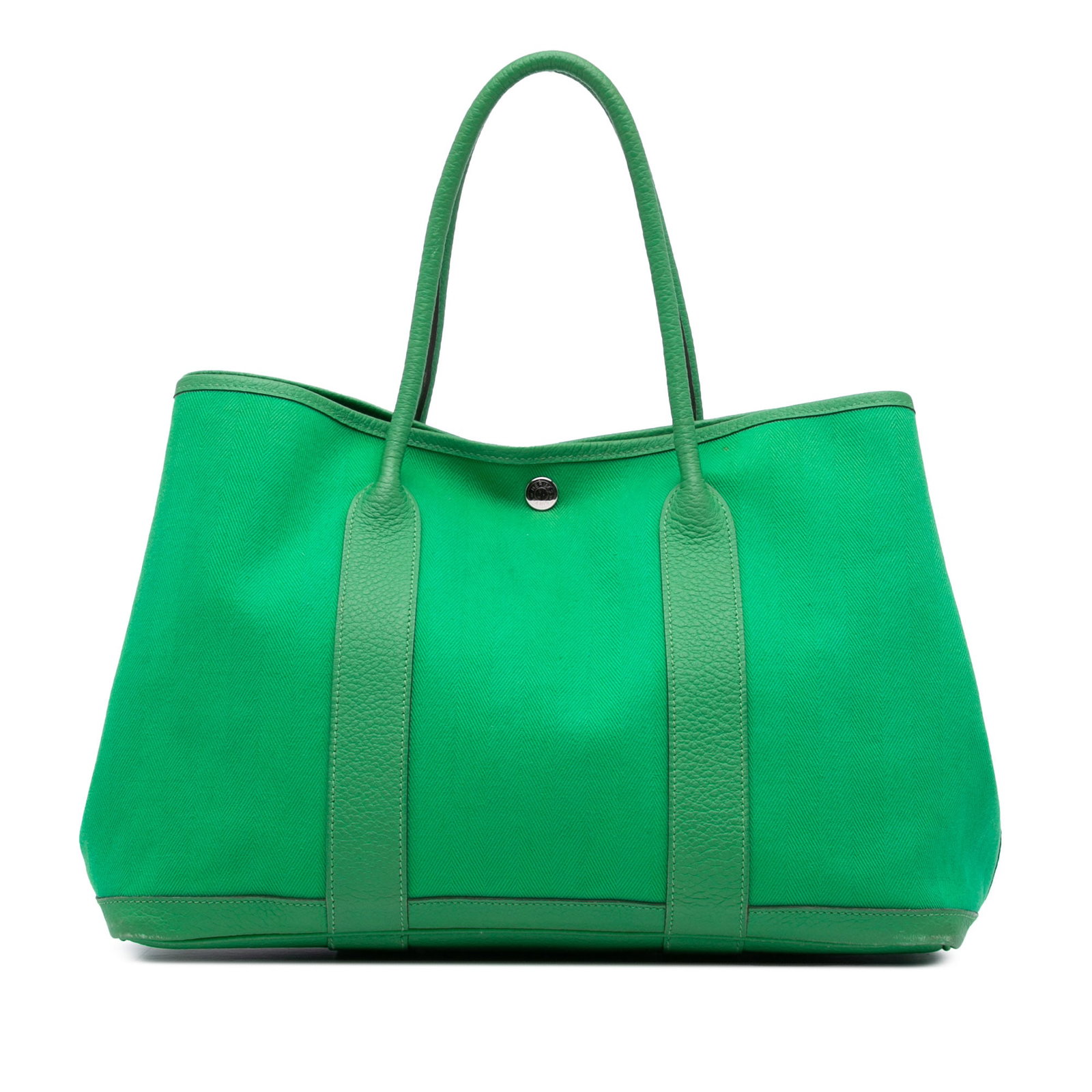 Hermes Garden Party 36 Green Canvas and Leather Handbag: Hermes Garden Party 36 Green Canvas and Leather Handbag Introducing the Hermes Toile and Negonda Garden Party 36, a stunning blend of style and practicality. This exquisite bag features a durable canv