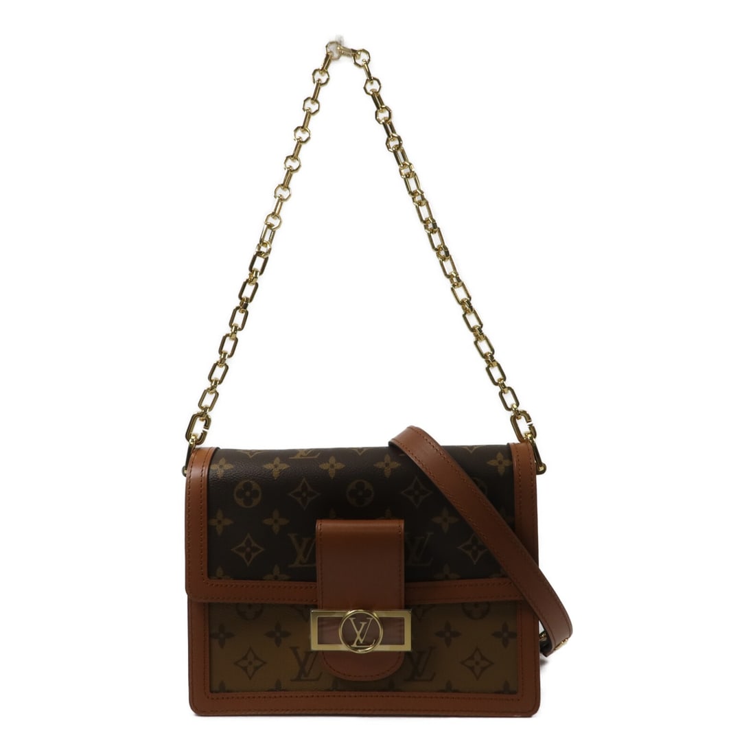 Louis Vuitton Dauphine MM M45958 Monogram Reverse Crossbody Bag: Louis Vuitton Dauphine MM M45958 Monogram Reverse Crossbody Bag Louis Vuitton Dauphine MM crossbody shoulder bag in Monogram Reverse x PVC coated canvas, presented in brown. It features a magnetic poc