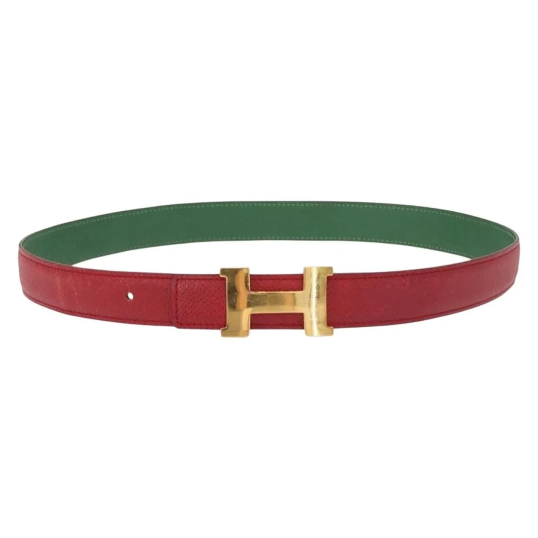 Red Leather Constance Belt by Hermes Size 73cm: Red Leather Constance Belt by Hermes Size 73cm This pre-owned Hermes Constance belt for women features red leather construction and measures 73 cm in length. It is made in France and shows signs of pr