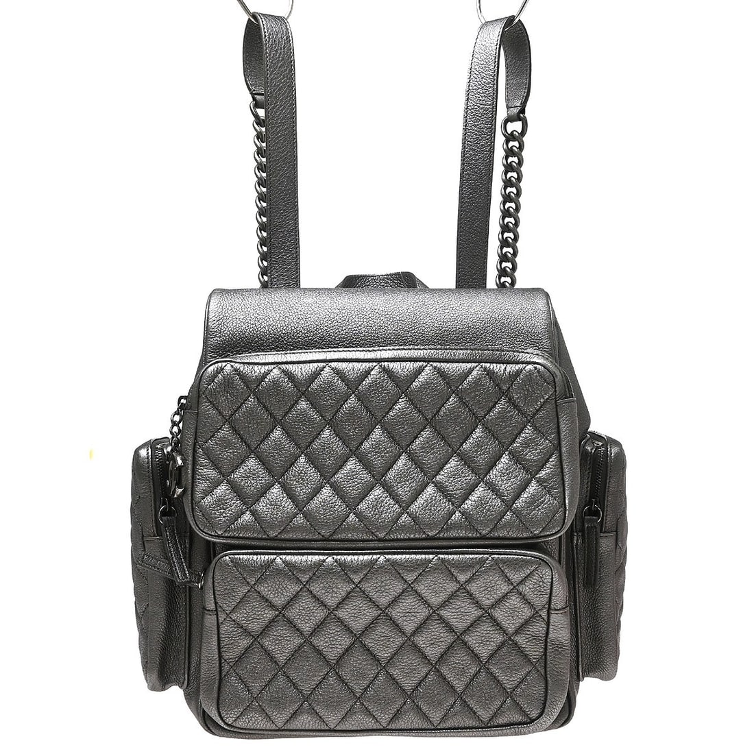 Chanel Calfskin Backpack in Silver with Authenticity Card: Chanel Calfskin Backpack in Silver with Authenticity Card This Chanel backpack is crafted in silver calfskin and made in Italy. It features four exterior zipper pockets and one interior zipper pocket.