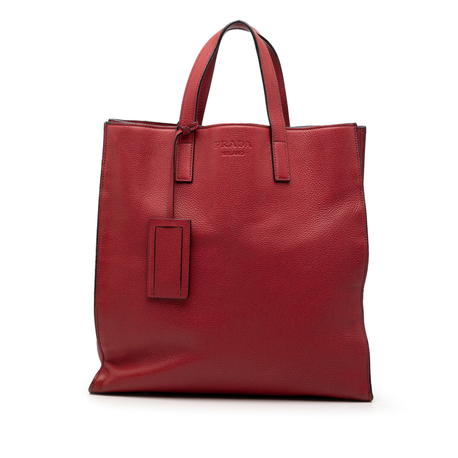 Prada red leather convertible shopper tote: Prada red leather convertible shopper tote This Prada Vitello Daino Convertible Shopper Tote is crafted from red leather and features flat leather straps, an open top, and interior zip and slip pocket