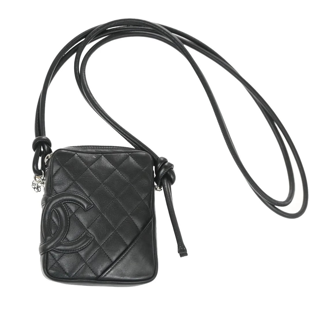 Black Leather Chanel Cambon Pochette Bag Unisex 12cm x 14.5cm x 3cm: Black Leather Chanel Cambon Pochette Bag Unisex 12cm x 14.5cm x 3cm The Chanel Cambon Pochette is crafted from quilted black leather and designed for unisex use. This accessory features a compact silh