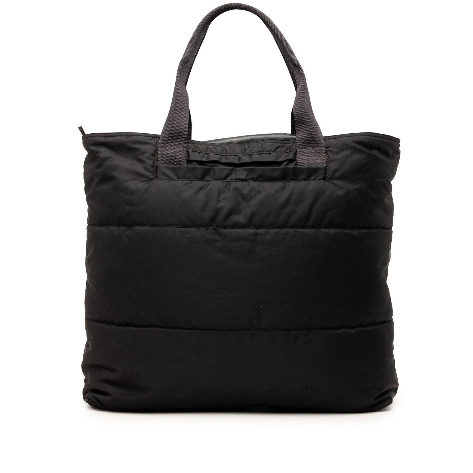 Prada Tessuto Bomber Tote Bag in Black Nylon: Prada Tessuto Bomber Tote Bag in Black Nylon This Prada Tessuto Bomber Tote is a black tote bag made in Italy with a nylon body and fabric construction. It features flat handles, a top zip closure, an