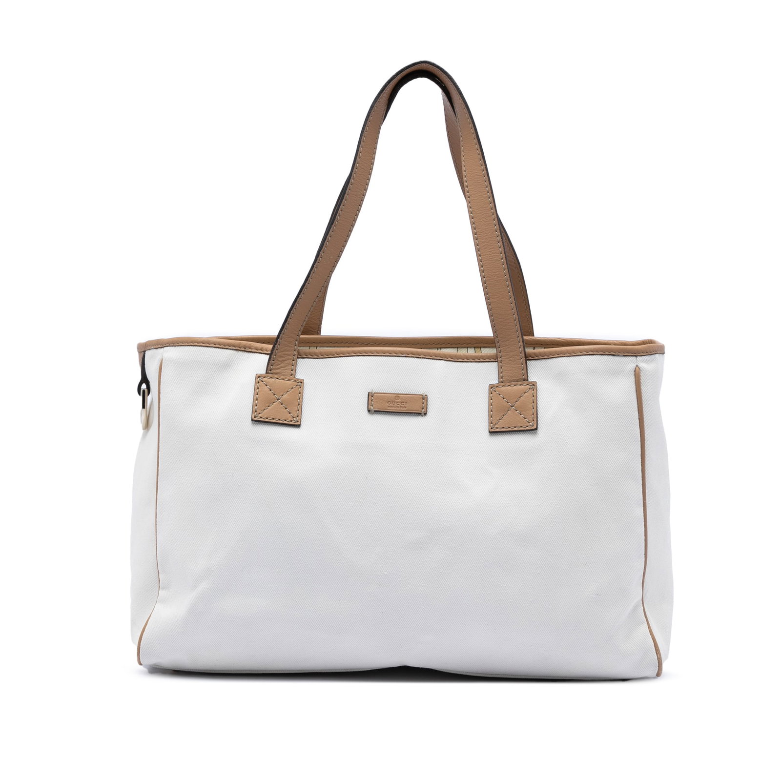 White Gucci Tote Bag with Leather Trim and Canvas Body: White Gucci Tote Bag with Leather Trim and Canvas Body This Gucci tote bag features a white canvas body with leather trim and flat leather handles. It is designed with an open top secured by a magneti