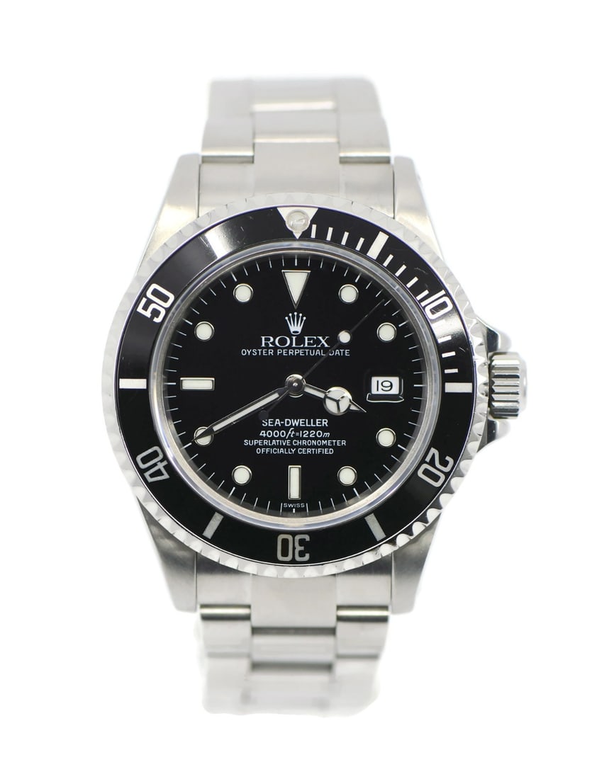 Rolex Sea-Dweller Stainless Steel Watch 16600 with Box and Papers: Rolex Sea-Dweller Stainless Steel Watch 16600 with Box and Papers This Rolex Sea Dweller 16600 is a stunning stainless steel wristwatch that combines elegance with functionality. Featuring a mechanica