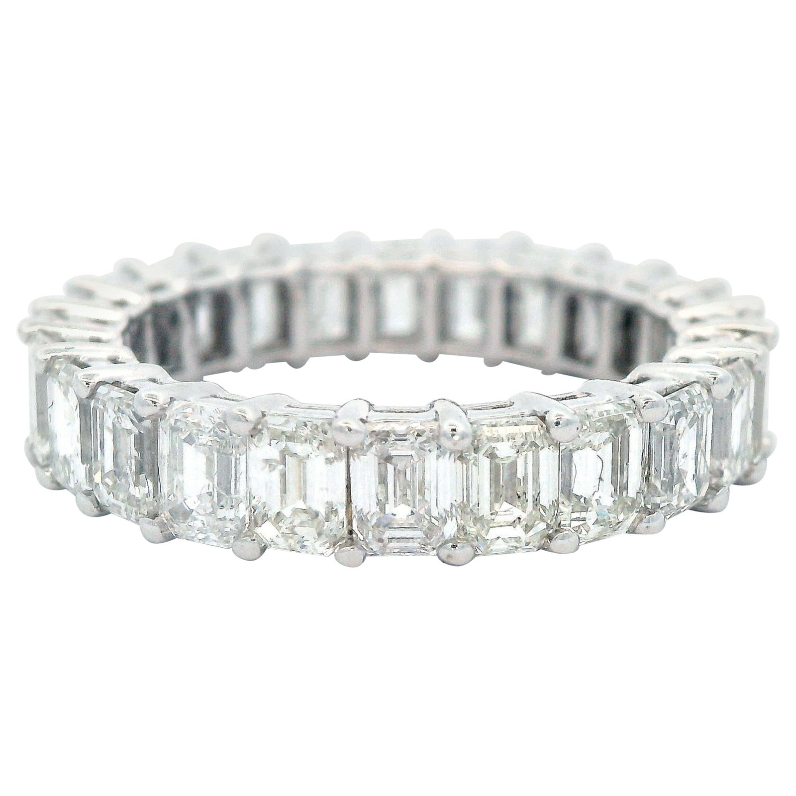 4.41ct Emerald Cut Diamond Eternity Band 18k White Gold: 4.41ct Emerald Cut Diamond Eternity Band 18k White Gold This stunning emerald cut diamond eternity band showcases 24 meticulously set diamonds totaling 4.41 carats, with approximately F/G color and SI