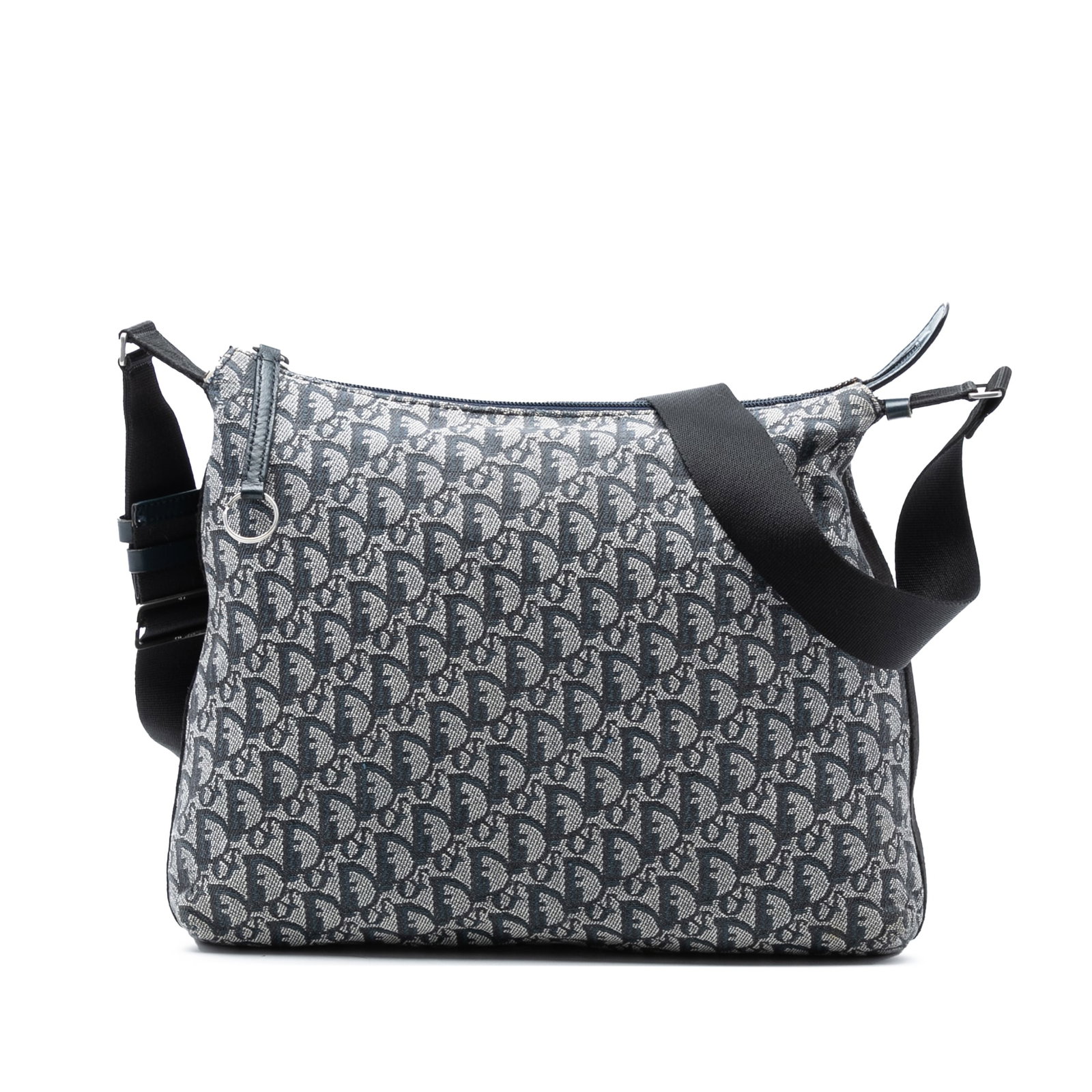 Dior Diorissimo Trotter Blue Canvas Adjustable Strap Crossbody Bag: Dior Diorissimo Trotter Blue Canvas Adjustable Strap Crossbody Bag The Diorissimo Trotter Canvas Crossbody is crafted with a blue fabric canvas body and features an adjustable flat shoulder strap, a t