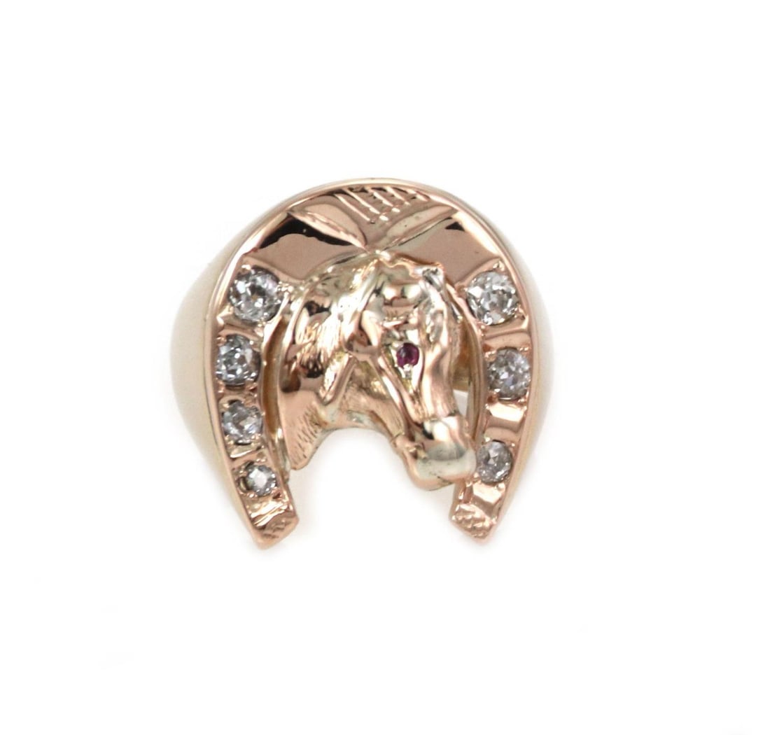 Victorian 14k Yellow Gold Horseshoe Ring with Diamonds and Ruby Eye: Victorian 14k Yellow Gold Horseshoe Ring with Diamonds and Ruby Eye This exquisite Victorian horseshoe ring is a stunning piece of craftsmanship, made from 14k yellow gold with a polished finish. The 