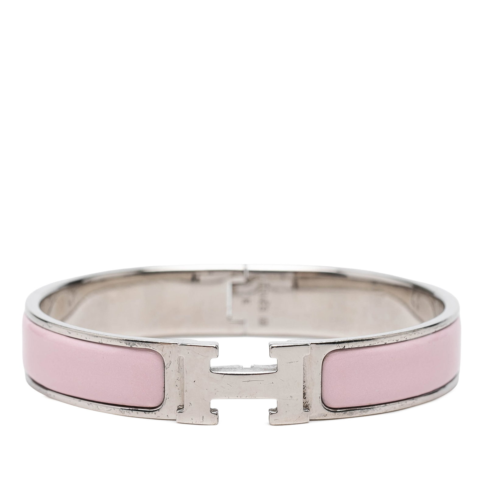 Hermes Clic H PM Narrow Enamel Bracelet: Hermes Clic H PM Narrow Enamel Bracelet Hermes Narrow Enamel Clic H Bracelet PM in pink, featuring an enamel and palladium-plated metal body with a metal clasp closure. Made in France and categorized 