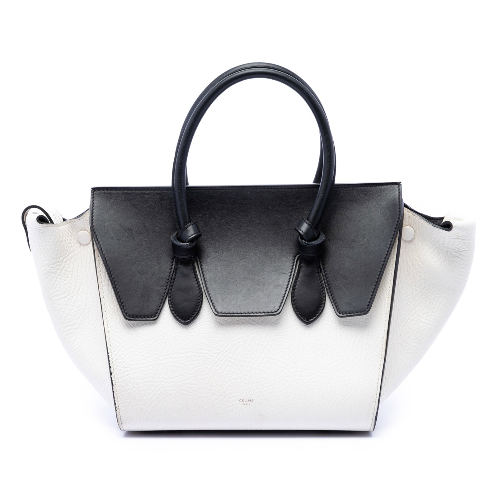 Celine white calfskin Tie Knot medium tote bag: Celine white calfskin Tie Knot medium tote bag This Celine Medium Bicolor Calfskin Tie Knot Tote features a leather body with rolled leather handles, a top flap closure, and interior zip and slip pock