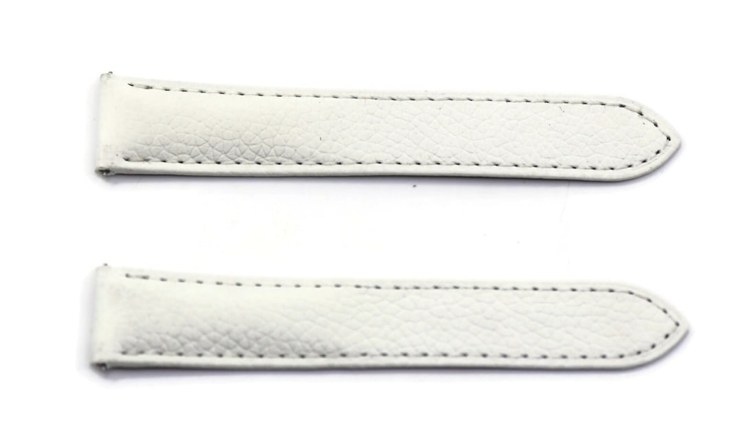 Cartier Authentic White Leather Wristwatch Band 18mm: Cartier Authentic White Leather Wristwatch Band 18mm This authentic Cartier white leather strap is designed specifically for wristwatches. With a width of 18 mm and a length of 99 mm, this strap offer