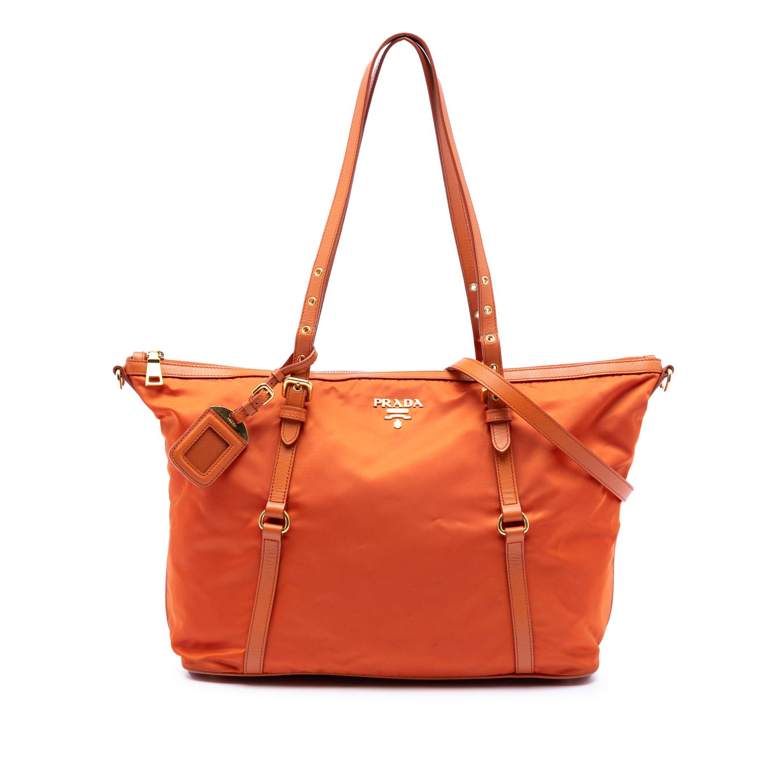 Orange Tessuto Satchel with Saffiano Leather Trim by Prada: Orange Tessuto Satchel with Saffiano Leather Trim by Prada This Prada satchel features a durable nylon body accented with saffiano leather trim, adjustable flat saffiano leather shoulder straps, and a