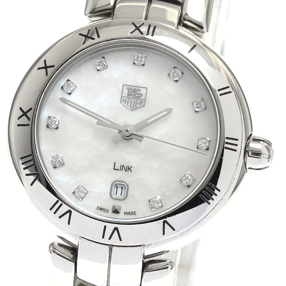 TAG Heuer Link Quartz Women's Steel Date Watch WAT1417.BA0954: TAG Heuer Link Quartz Women's Steel Date Watch WAT1417.BA0954 This TAG Heuer Link women's wristwatch (model WAT1417.BA0954) features a stainless steel case and bracelet with a white mother-of-pearl di