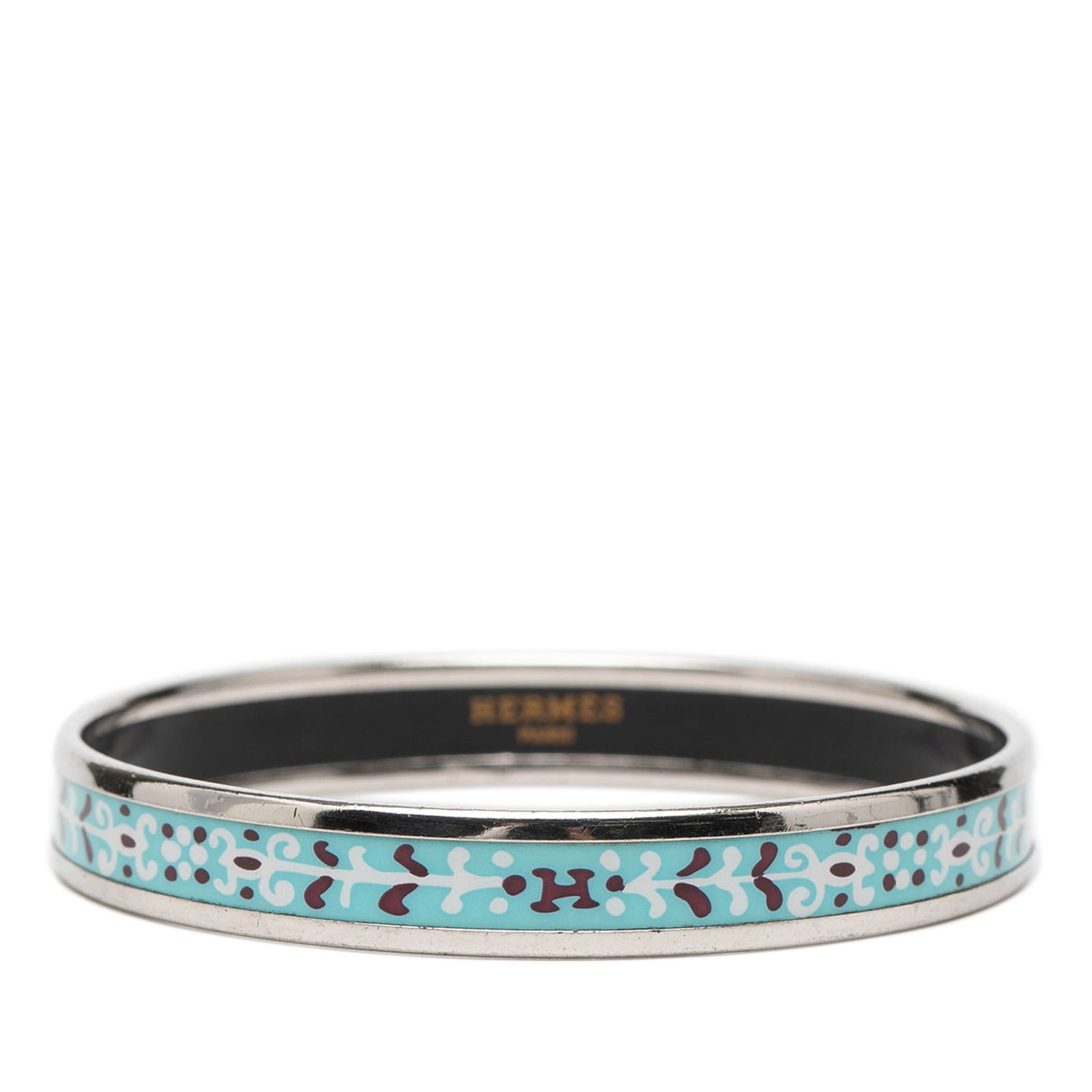 Hermes Blue Enamel Bracelet with Palladium Hardware Flower Petal Design: Hermes Blue Enamel Bracelet with Palladium Hardware Flower Petal Design This Hermes Narrow Flower Petal Enamel Bangle 62 features a printed enamel body in blue with palladium-finished metal hardware. 
